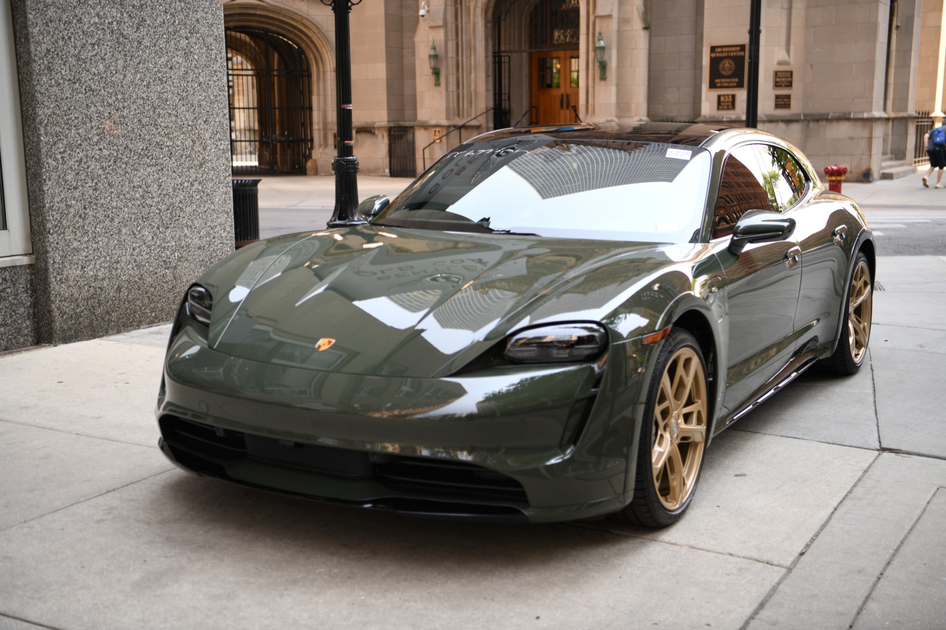 Porsche store taycan gold